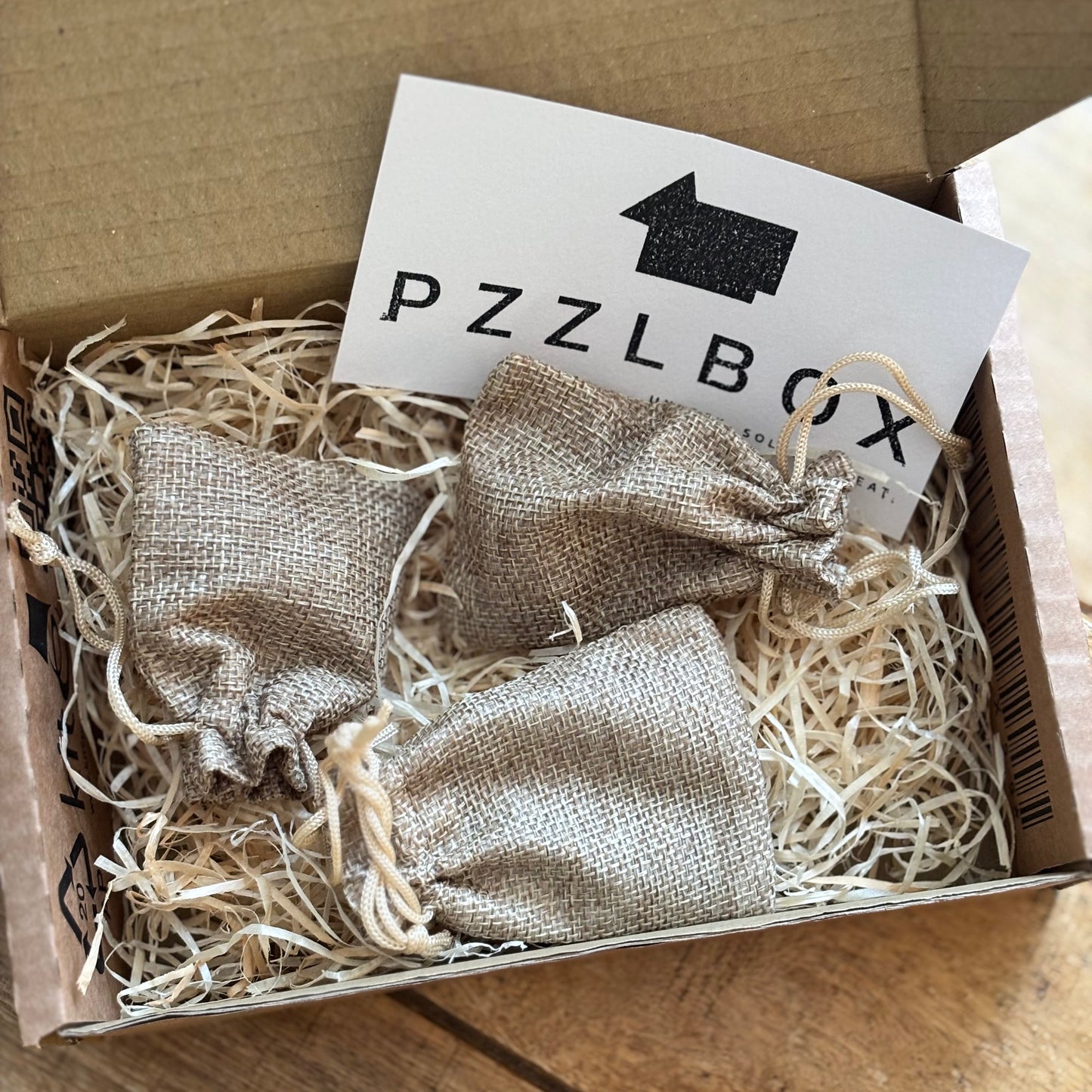 Surprise Box XS (3 brainteasers)